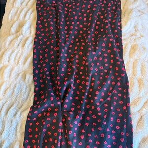 Princess Polly Black Skirt with Red Floral Accents